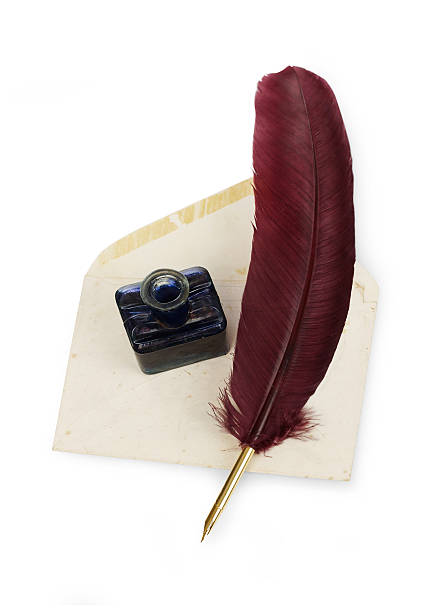istock Calligraphy quill, letter and ink well 597938436