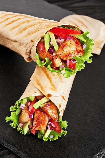 istock Burrito with grilled chicken and vegetables 597942726