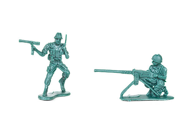 istock miniature  soldiers toy  on white background 597943264