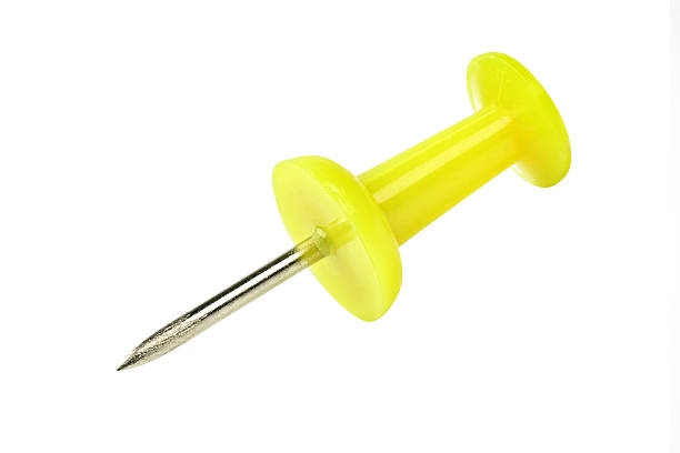 istock yellow pushpin board isolated on white background 597944488