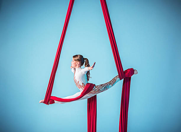 istock Graceful gymnast performing aerial exercise 597949046