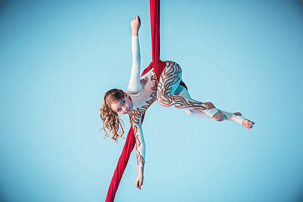 istock Graceful gymnast performing aerial exercise 597949468
