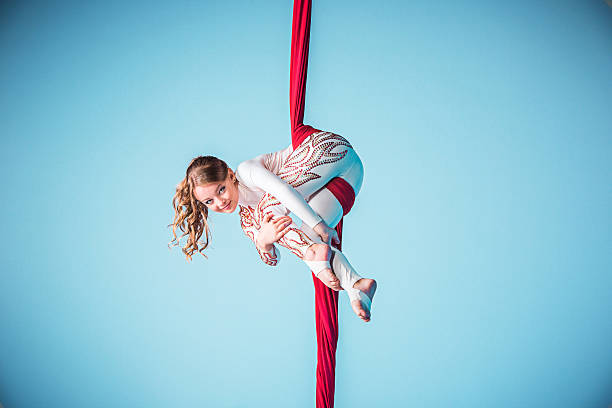 istock Graceful gymnast performing aerial exercise 597949778