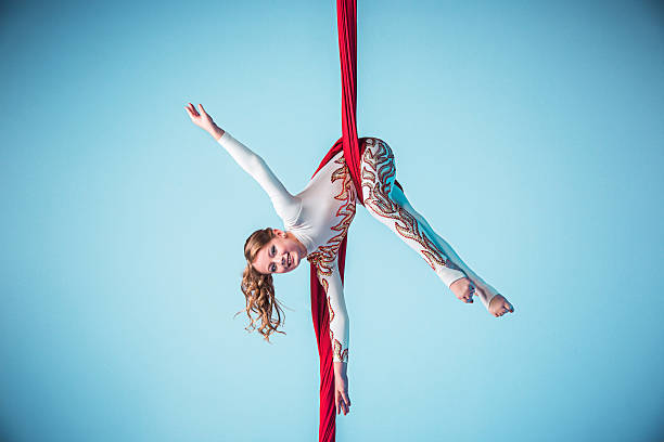 istock Graceful gymnast performing aerial exercise 597950094