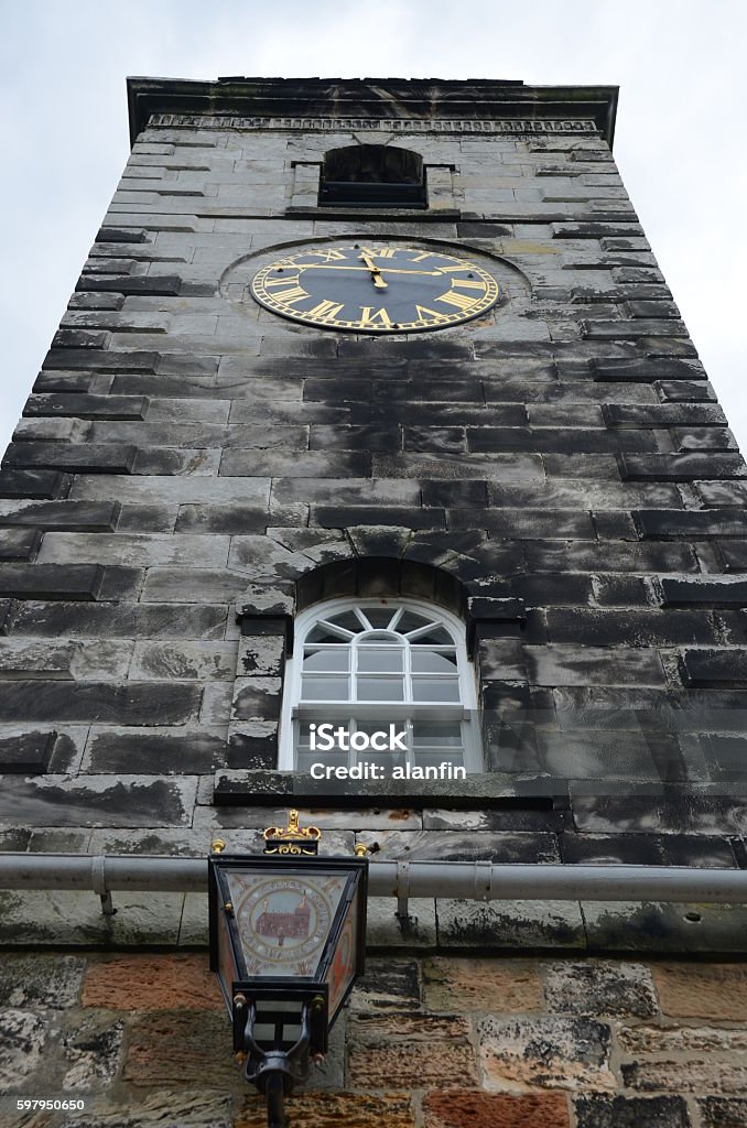 Clock Tower A view of the clock tower on the townhouse in Culross Brick Stock Photo