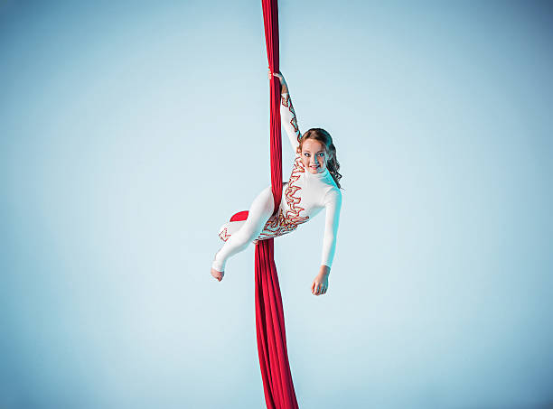 istock Graceful gymnast performing aerial exercise 597952704