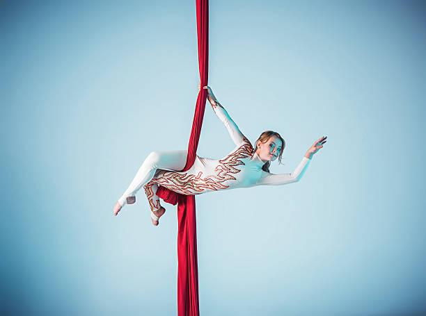istock Graceful gymnast performing aerial exercise 597952906