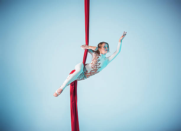 istock Graceful gymnast performing aerial exercise 597953076