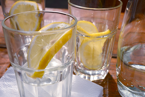 Lemon in a glass with water