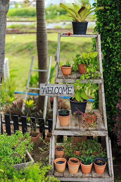 istock Welcome sign hang on wood class 597954742