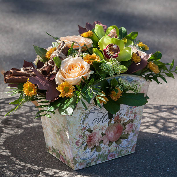 istock Beautiful bouquet with roses, cinnamon and orchids 597955092
