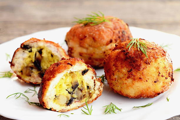 istock Fried meat balls stuffed with cheese andmushrooms 597955556