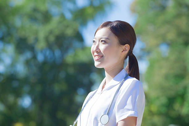 istock Japanese nurse in uniform 597955916
