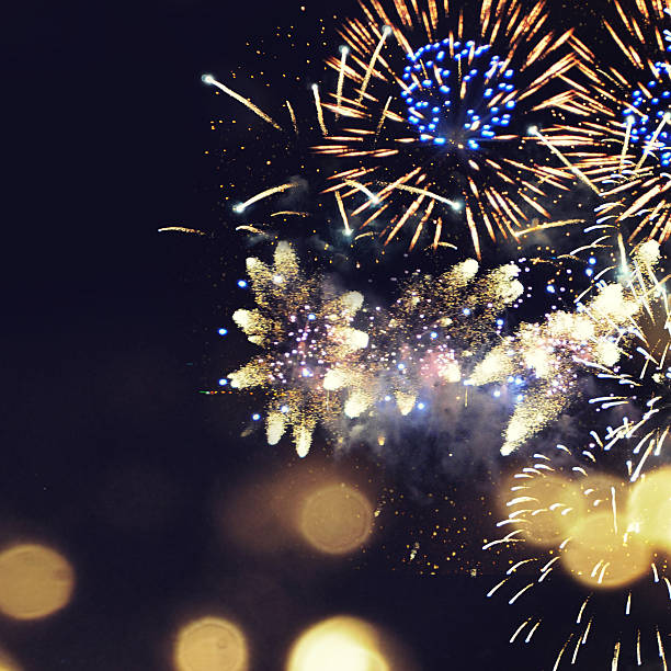 istock Fantastic colorful fireworks with  copyspace. Background for New 597956120