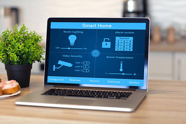 istock laptop with smart home on the screen in the room 597956150