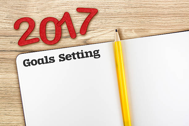 istock Top view of 2017 new year with blank open book 597957134