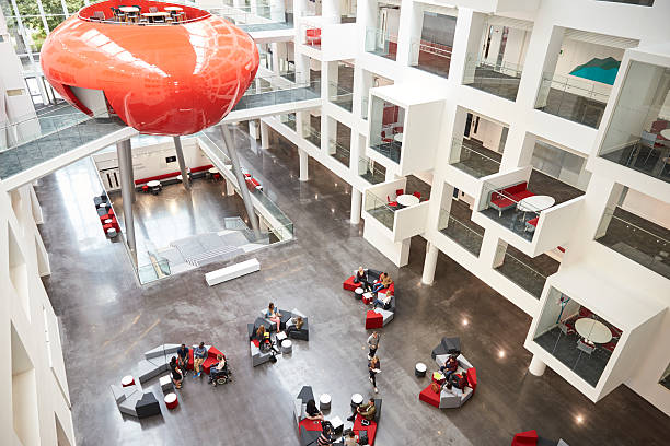 istock Modernist interior of a university atrium, elevated view 597957810
