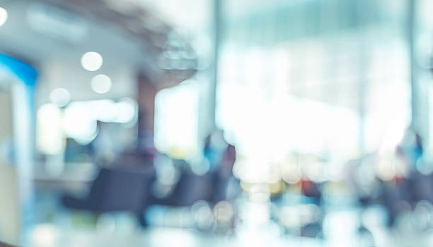 istock Blur background,businessman walking at corridor in convention ha 597958430