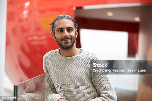 Asian Male Student In Modern University Building Portrait Stock Photo - Download Image Now