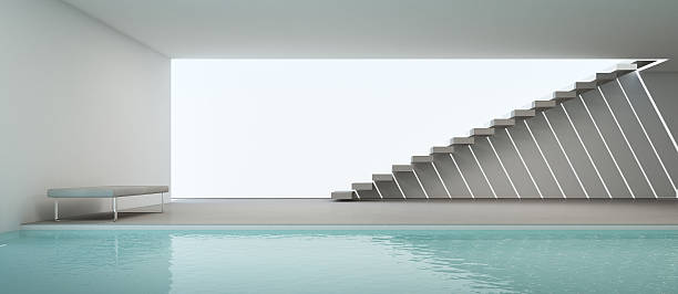 istock modern house interior with swimming pool and white wall 597959360