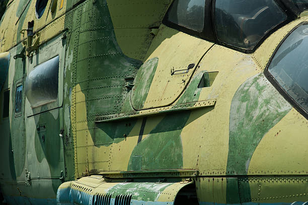 istock Aluminum fuselage and rivets on old airplane 597959368