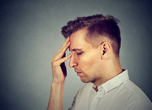 istock sad depressed, alone, disappointed gloomy man 597960532