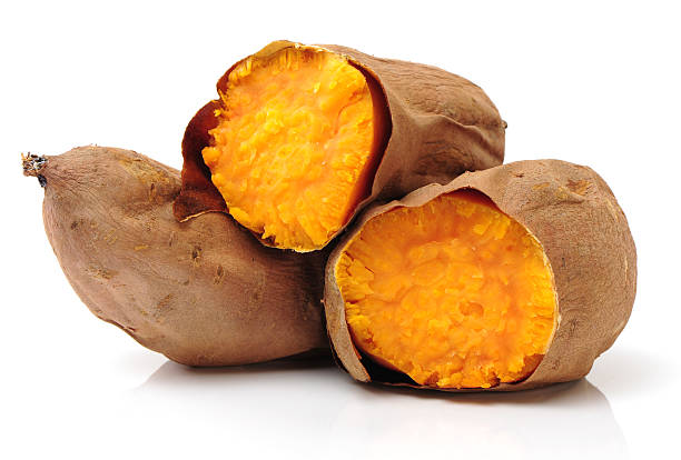 roasted sweet potatoes stock photo