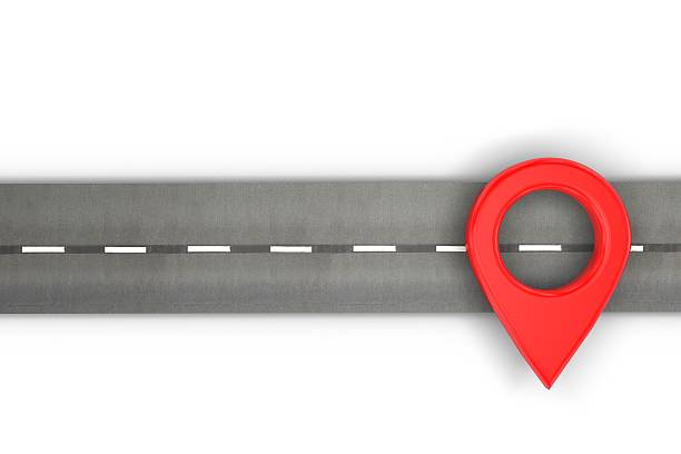 istock Red location marker on a road 597960750