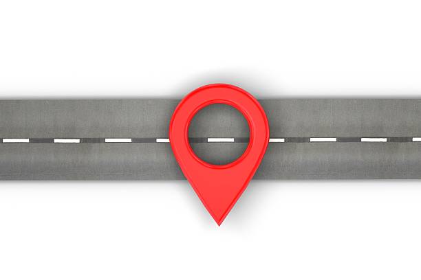 istock Red location marker on a road 597960788