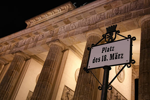 istock Brandenburg gate at night in Berlin, Germany 597963090