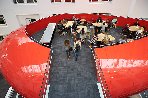 istock Walkway to university mezzanine social area, elevated view 597963308