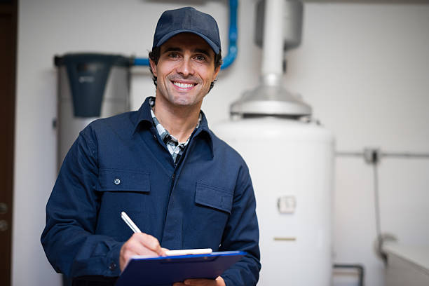 istock Hot-water heater service 597963422