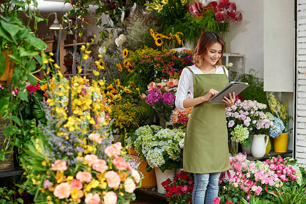 occupato di lavoro - florist foto e immagini stock