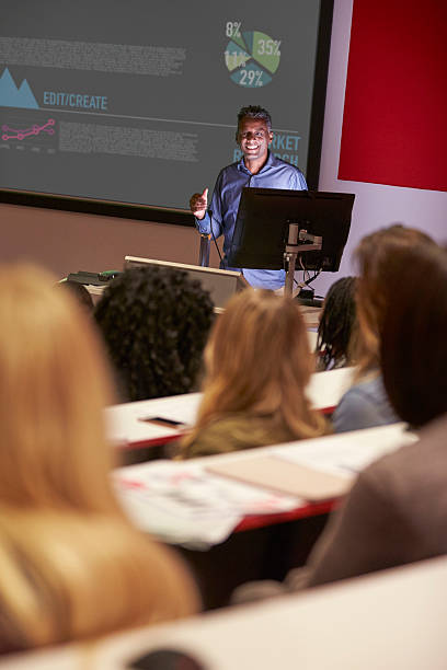 istock Lecture in a darkened university lecture theatre, vertical 597966440