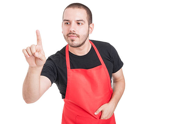 istock Supermarket seller pointing on modern touchscreen 597968288