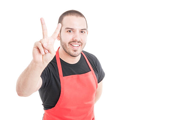 istock Trusthworthy hypermarket employee doing peace sign 597968434