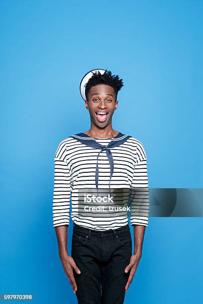 Afro American Young Sailor Standing At Attention Stock Photo - Download Image Now - Men, Sailor Suit, Studio Shot