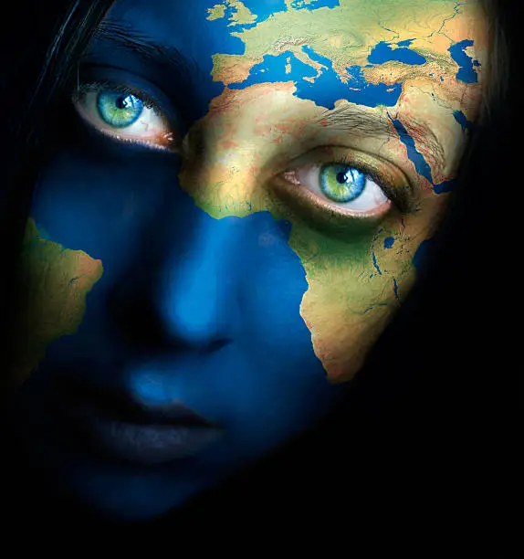 Planet earth and woman face 