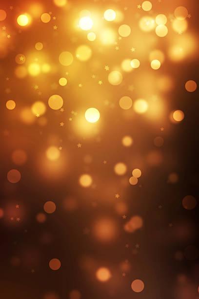 istock colorful golden christmas bokeh background 598053562