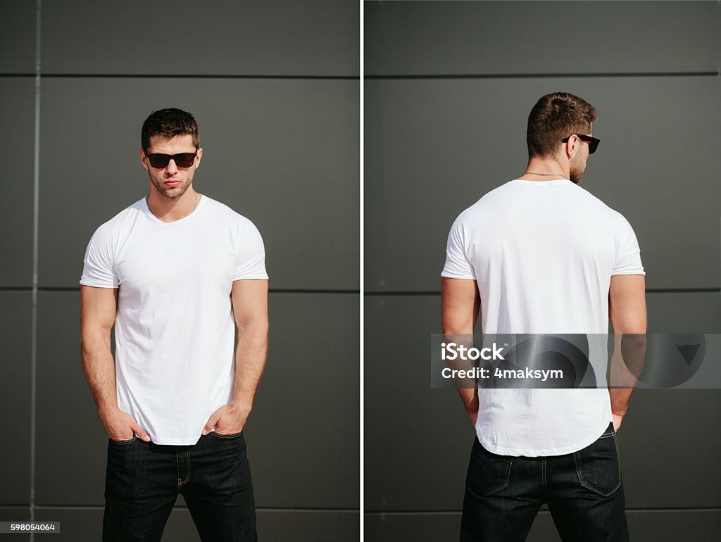 Man wearing white blank t-shirt with space for your logo Adult Stock Photo