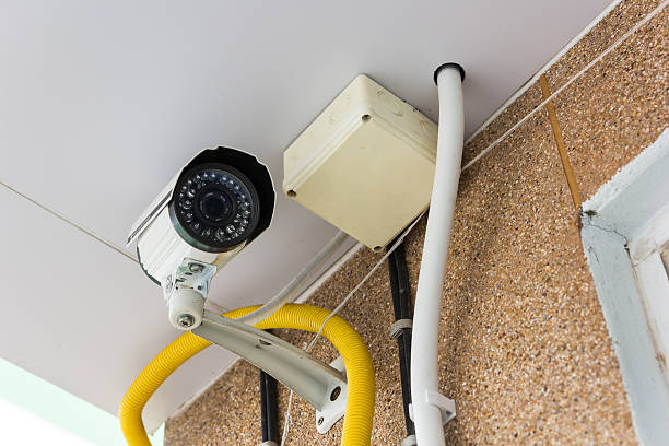 istock Security of CCTV Camera on the wall 598054486