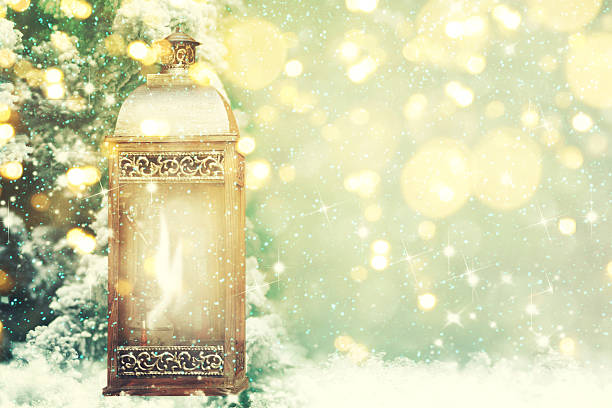 istock Christmas lantern with Christmas decoration on the snow 598055428