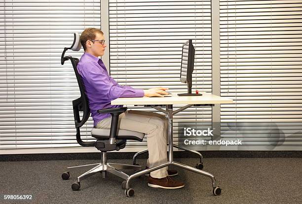 Correct Sitting Position At Workstation With Computer Stock Photo - Download Image Now