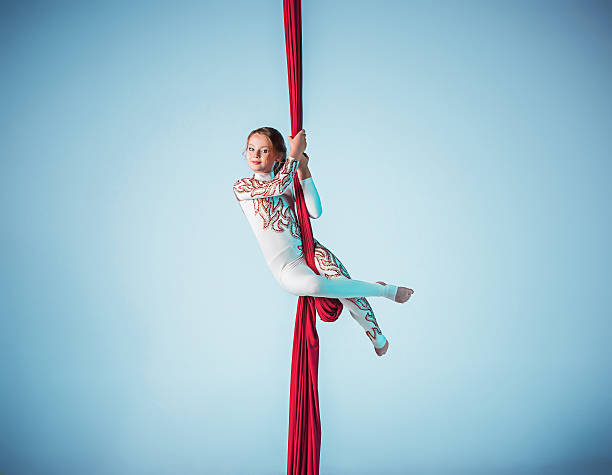 istock Graceful gymnast performing aerial exercise 598058038