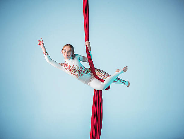 istock Graceful gymnast performing aerial exercise 598058168