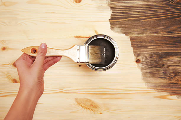 istock Hand painting on wooden table 598058314