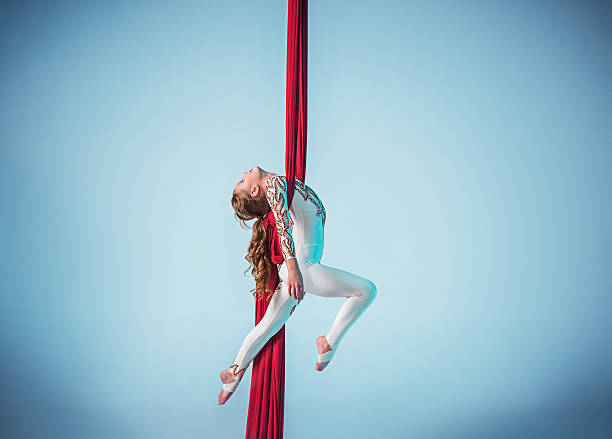 istock Graceful gymnast performing aerial exercise 598059012