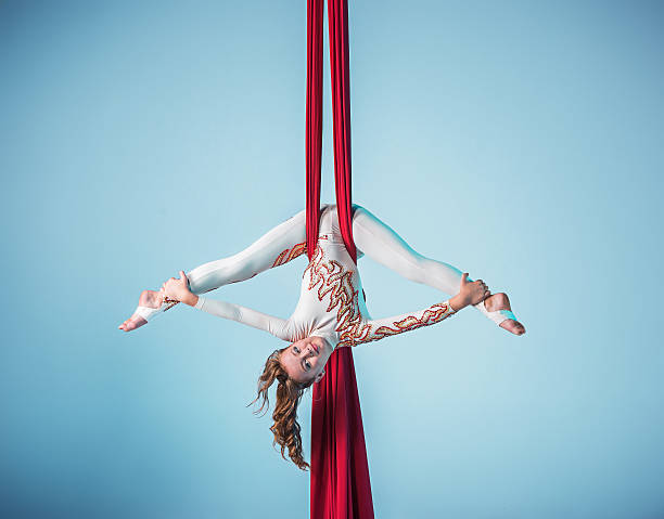 istock Graceful gymnast performing aerial exercise 598059142