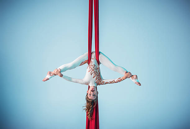 istock Graceful gymnast performing aerial exercise 598059294