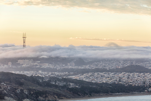 Early morning fog blankets the Background, Sutro Tower and Golden Gate Park on the background.